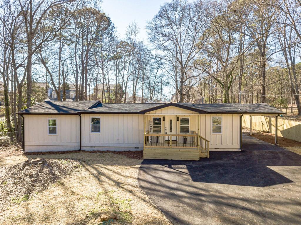 3617 Bob White Lane Southwest Loganville, GA 30052 - Photo 3 of 48 a view of a house with a yard