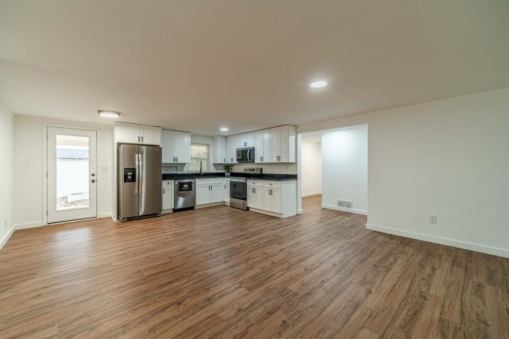 3617 Bob White Lane Southwest Loganville, GA 30052 - Photo 9 of 48 a view of kitchen with wooden floor