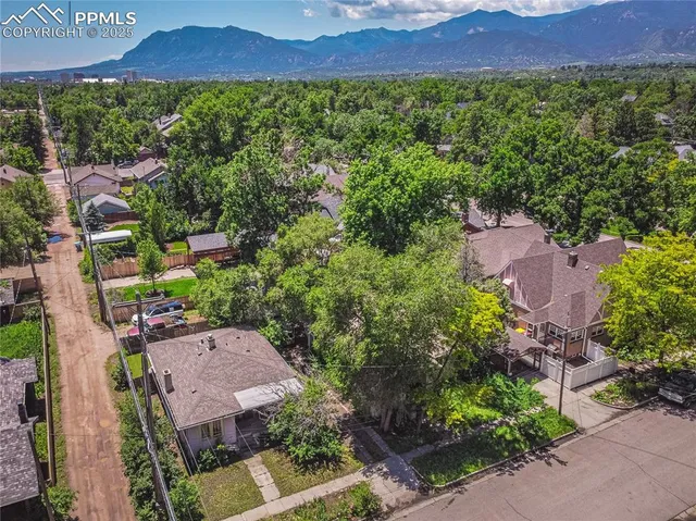 an aerial view of a house with a garden