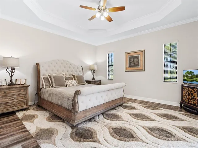 a bedroom with furniture and a window