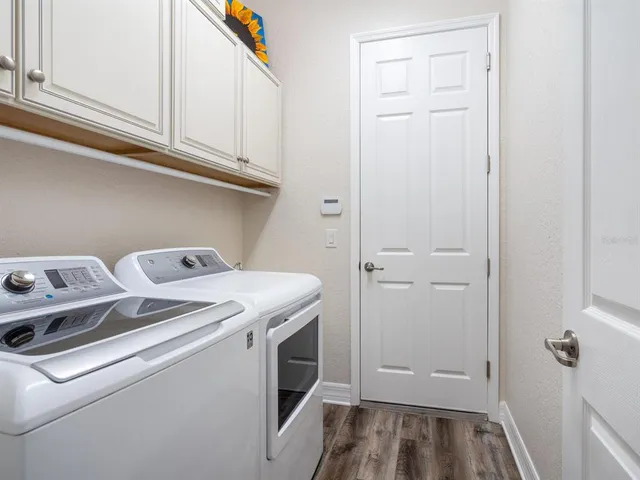 a view of a livingroom with furniture and a porch
