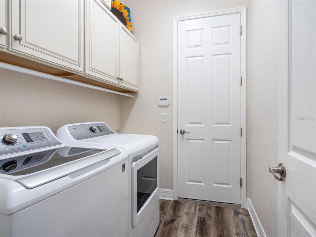 16532 Hillside Circle Lakewood Ranch, FL 34202 - Photo 33 of 67 a utility room with dryer and washer