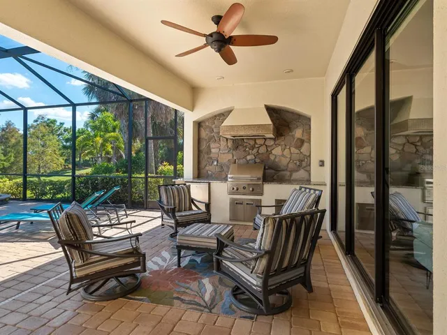 a view of swimming pool from a patio