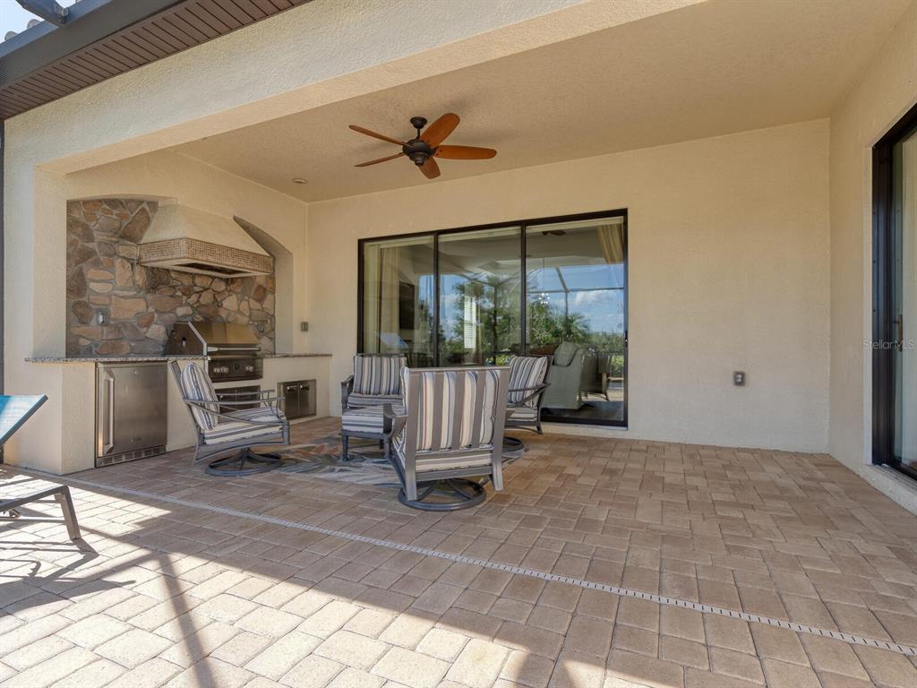 16532 Hillside Circle Lakewood Ranch, FL 34202 - Photo 37 of 67 a view of a livingroom with furniture and a porch