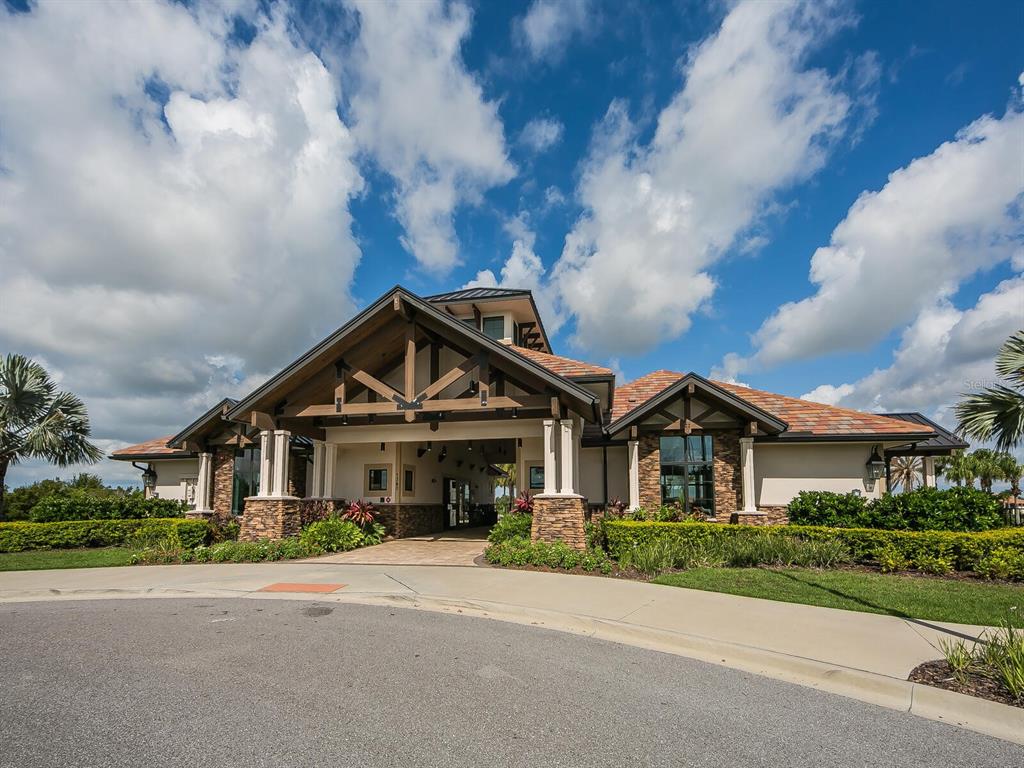16532 Hillside Circle Lakewood Ranch, FL 34202 - Photo 52 of 67 a front view of a house with a yard