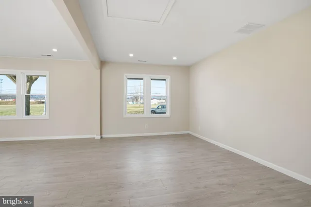 an empty room with windows