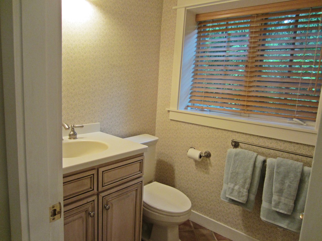 9 West Riding Street Wellesley, MA 02482 - Photo 5 of 16 a bathroom with a sink and toilet