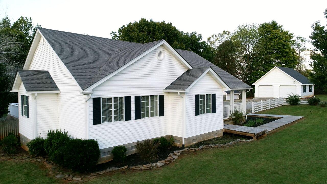 1650 Dickerson Road Goodview, VA 24095 - Photo 1 of 30 a view of house with backyard
