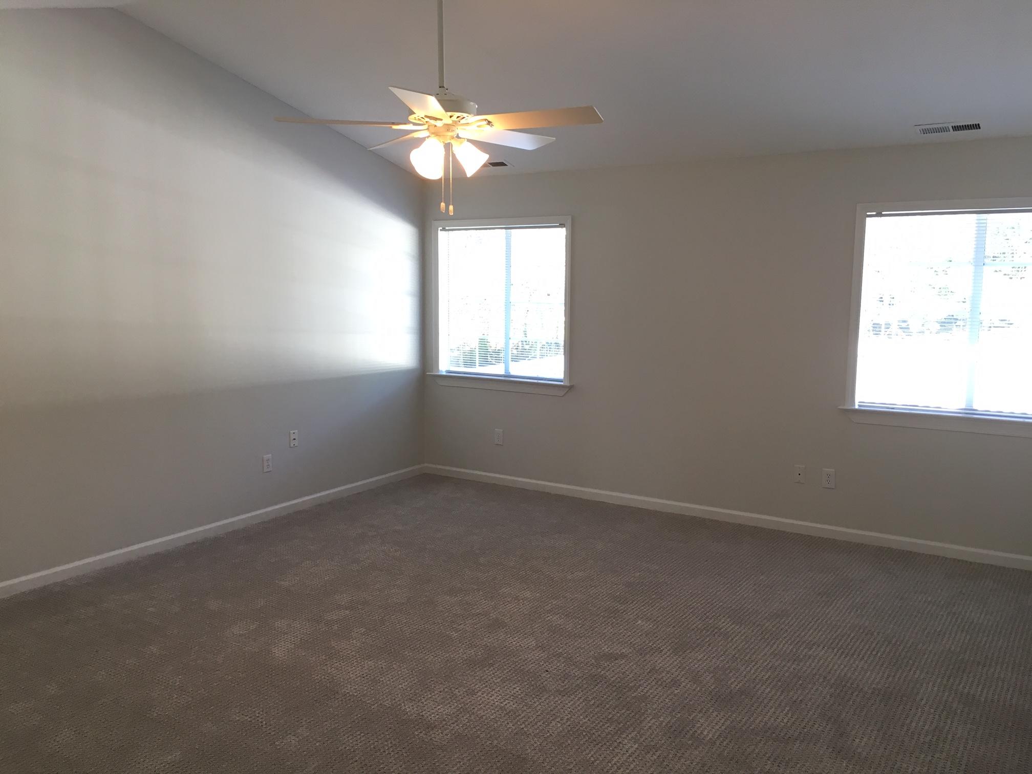 1650 Dickerson Road Goodview, VA 24095 - Photo 12 of 30 wooden floor in an empty room with a window
