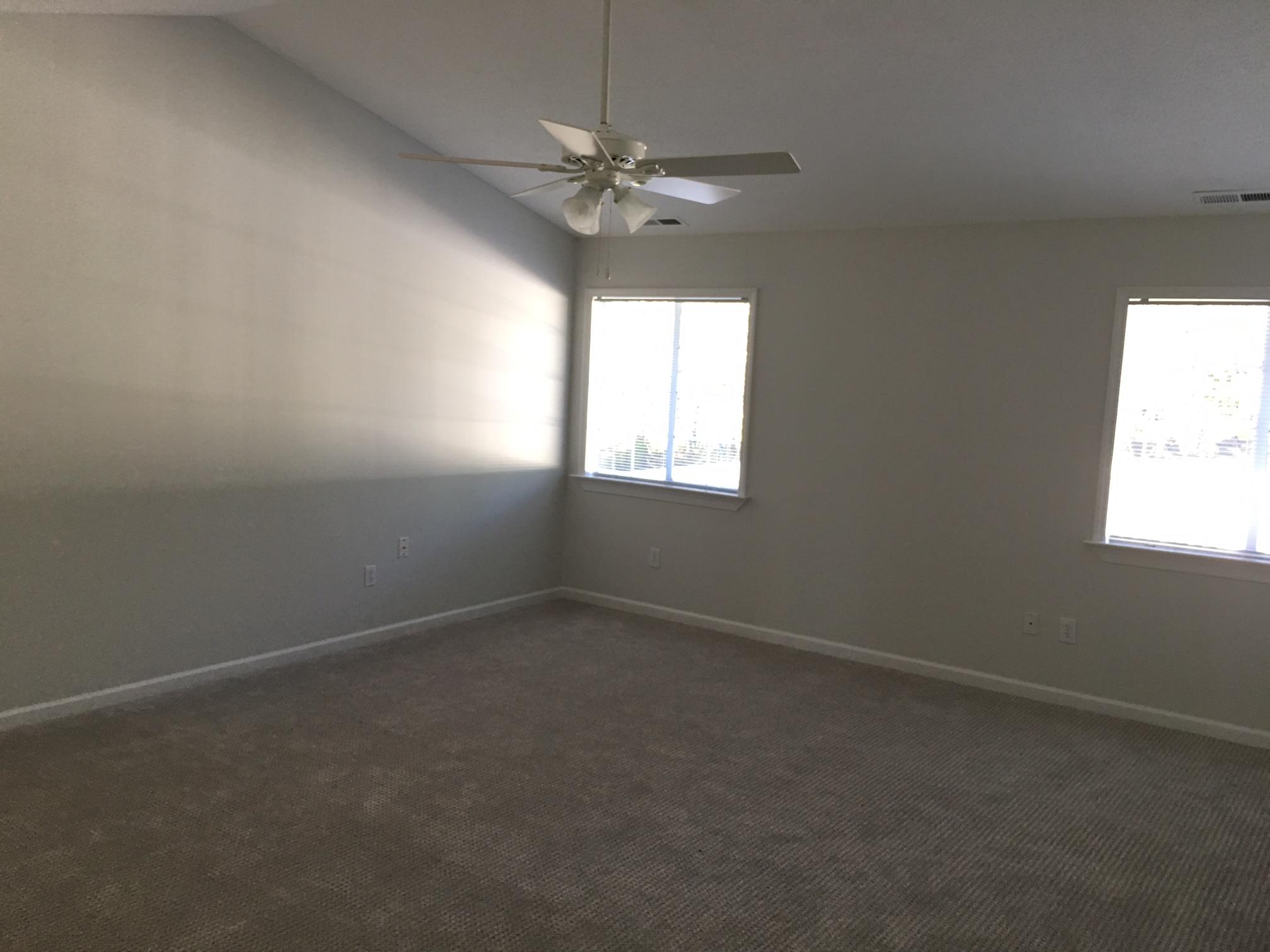 1650 Dickerson Road Goodview, VA 24095 - Photo 13 of 30 an empty room with a window and a fan