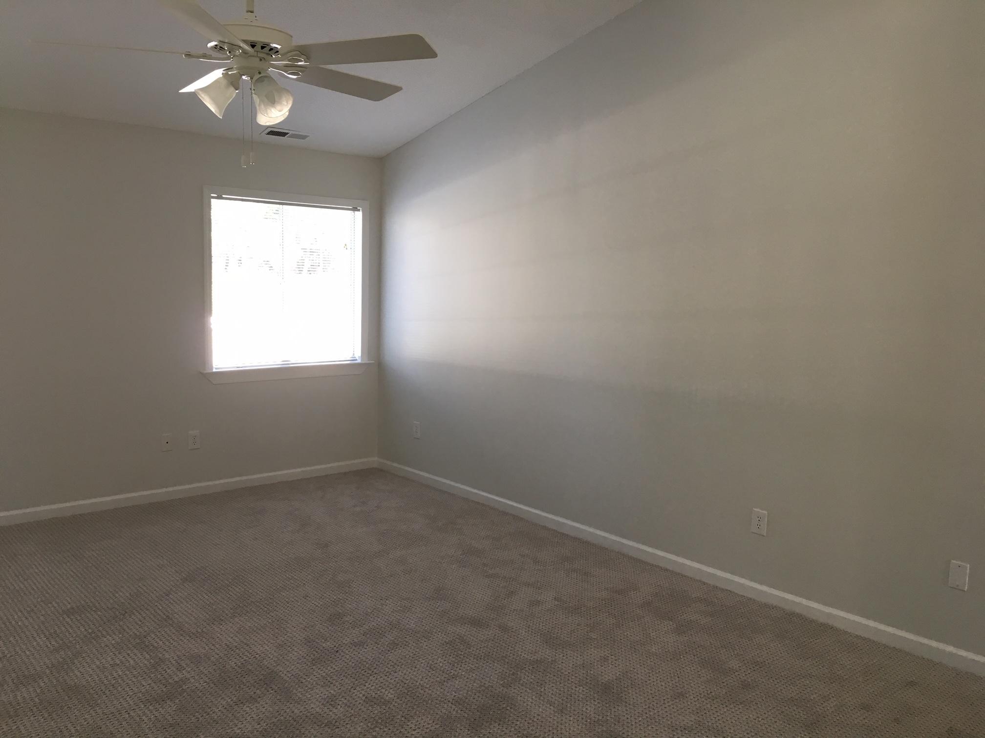 1650 Dickerson Road Goodview, VA 24095 - Photo 14 of 30 wooden floor in an empty room with a window