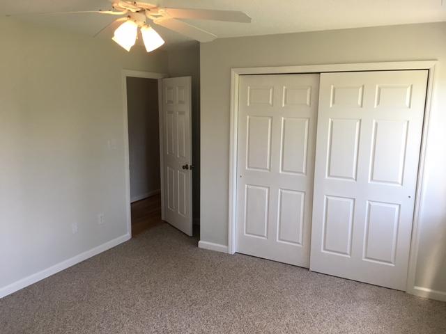 1650 Dickerson Road Goodview, VA 24095 - Photo 19 of 30 a view of an empty room with a chandelier fan