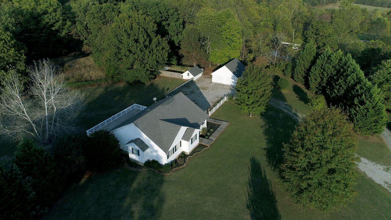 1650 Dickerson Road Goodview, VA 24095 - Photo 3 of 30 an aerial view of a house with pool yard outdoor and lake view