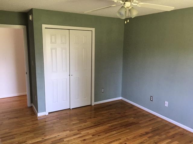 1650 Dickerson Road Goodview, VA 24095 - Photo 23 of 30 a view of an empty room with wooden floor