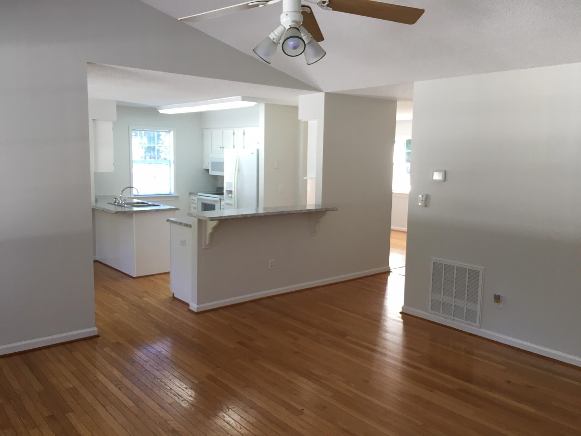 1650 Dickerson Road Goodview, VA 24095 - Photo 8 of 30 a view of a kitchen with wooden floor and a sink