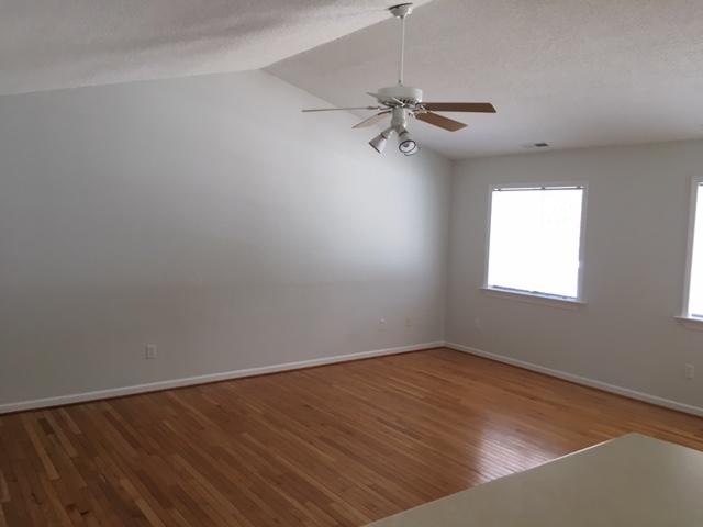 1650 Dickerson Road Goodview, VA 24095 - Photo 9 of 30 wooden floor in an empty room with a window