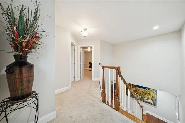 a view of a hallway with a white walls