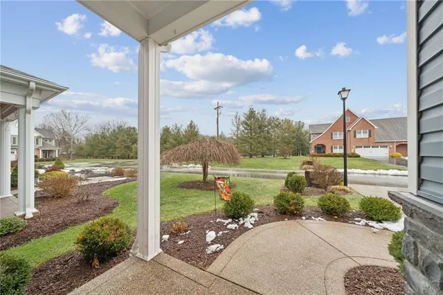 a view of a garden with a fountain