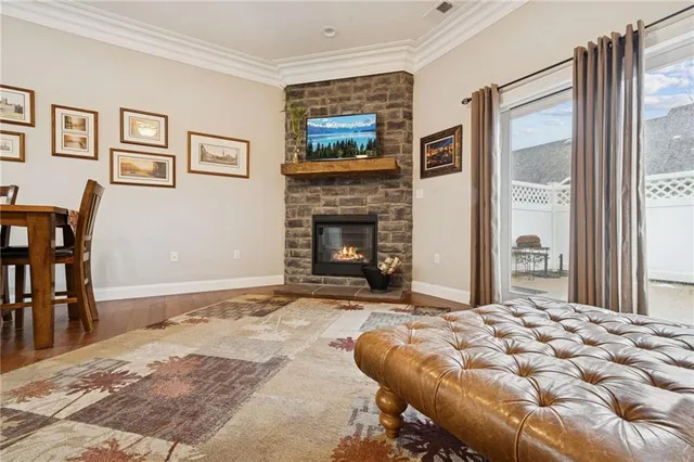 a bedroom with a bed and a fireplace