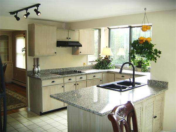 2 Mohawk Road Canton, MA 02021 - Photo 6 of 6 a kitchen with a sink a counter top space and cabinets
