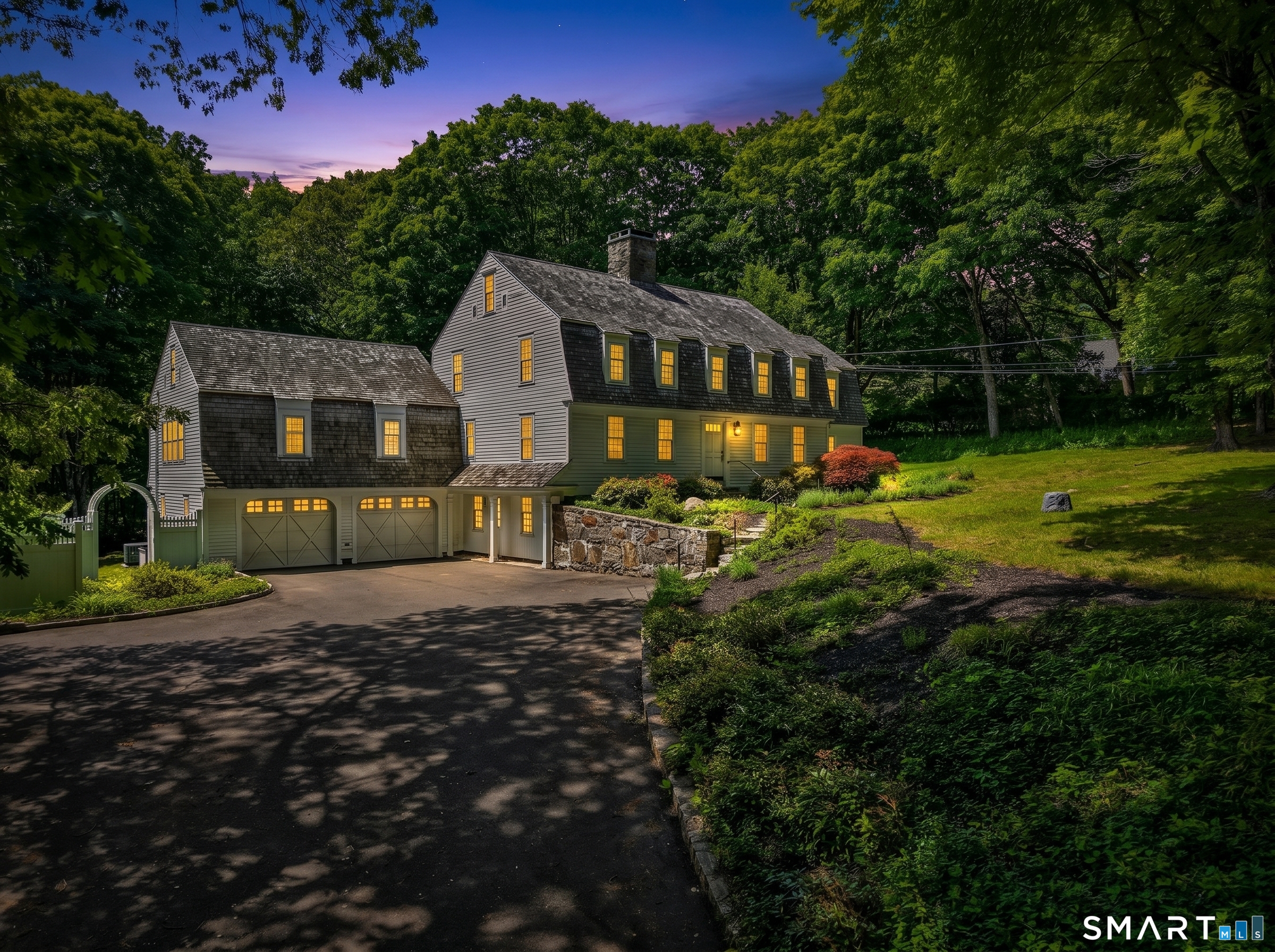 14 Cow Pen Hill Road Killingworth, CT 06419 - Photo 6 of 40 A breathtaking aerial perspective at twilight showcases the beauty, privacy, and tranquility of this exceptional property.
