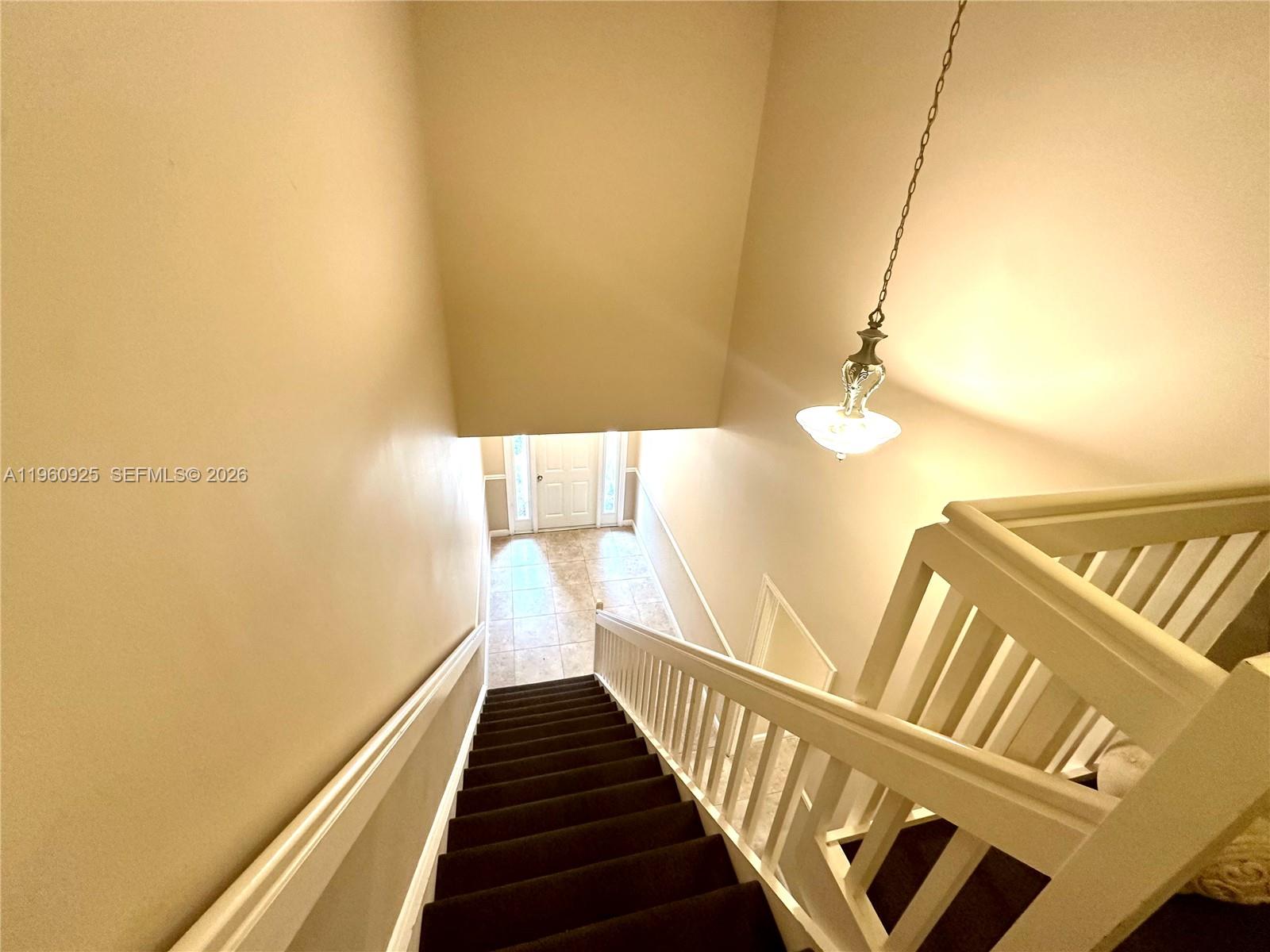 5790 Coach House Circle, Unit E Boca Raton, FL 33486 - Photo 65 of 65 a view of hallway with wooden floor