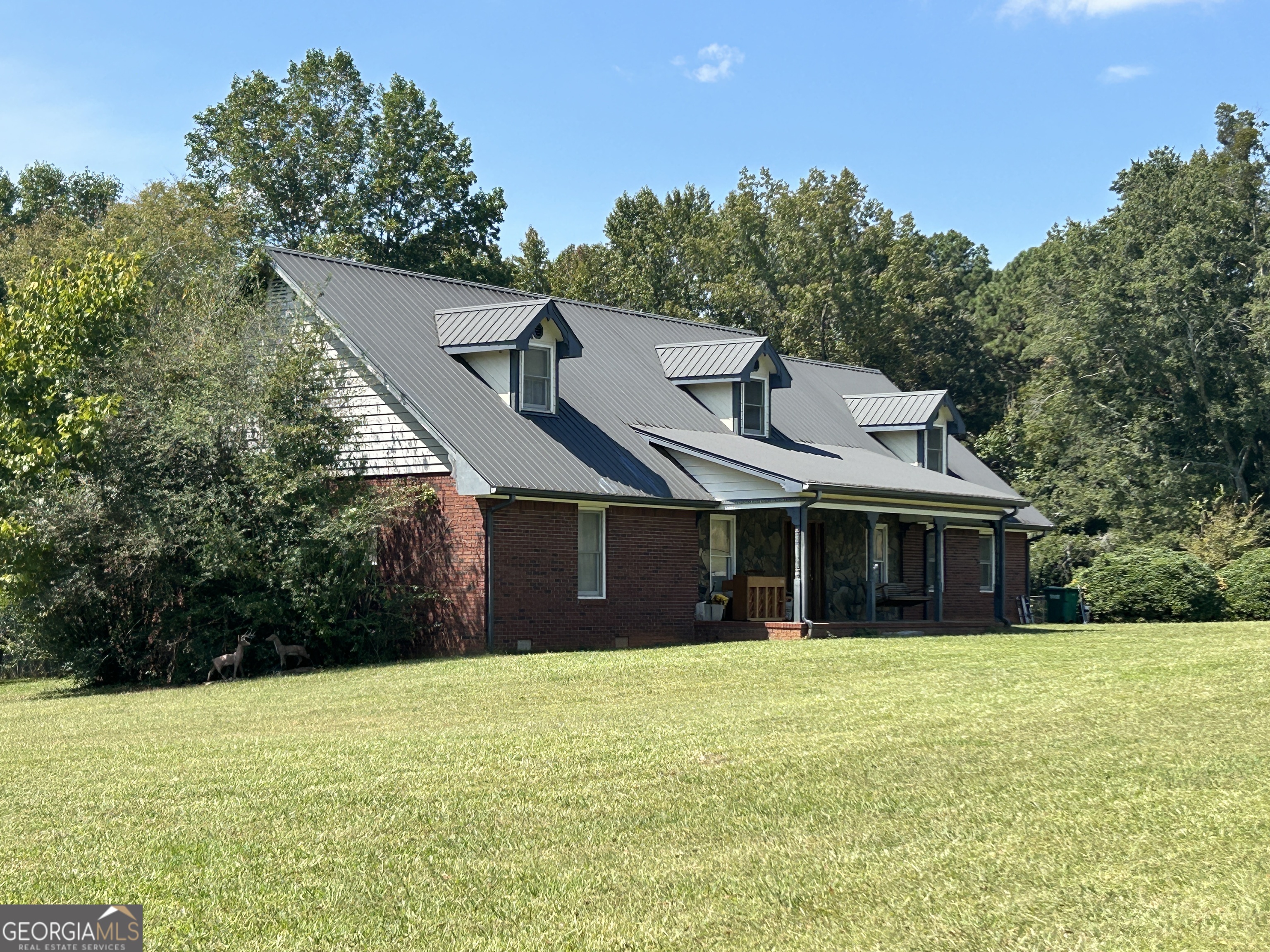 817 Yonah Homer Road Homer, GA 30547 - Photo 1 of 43 a front view of house with yard and green space