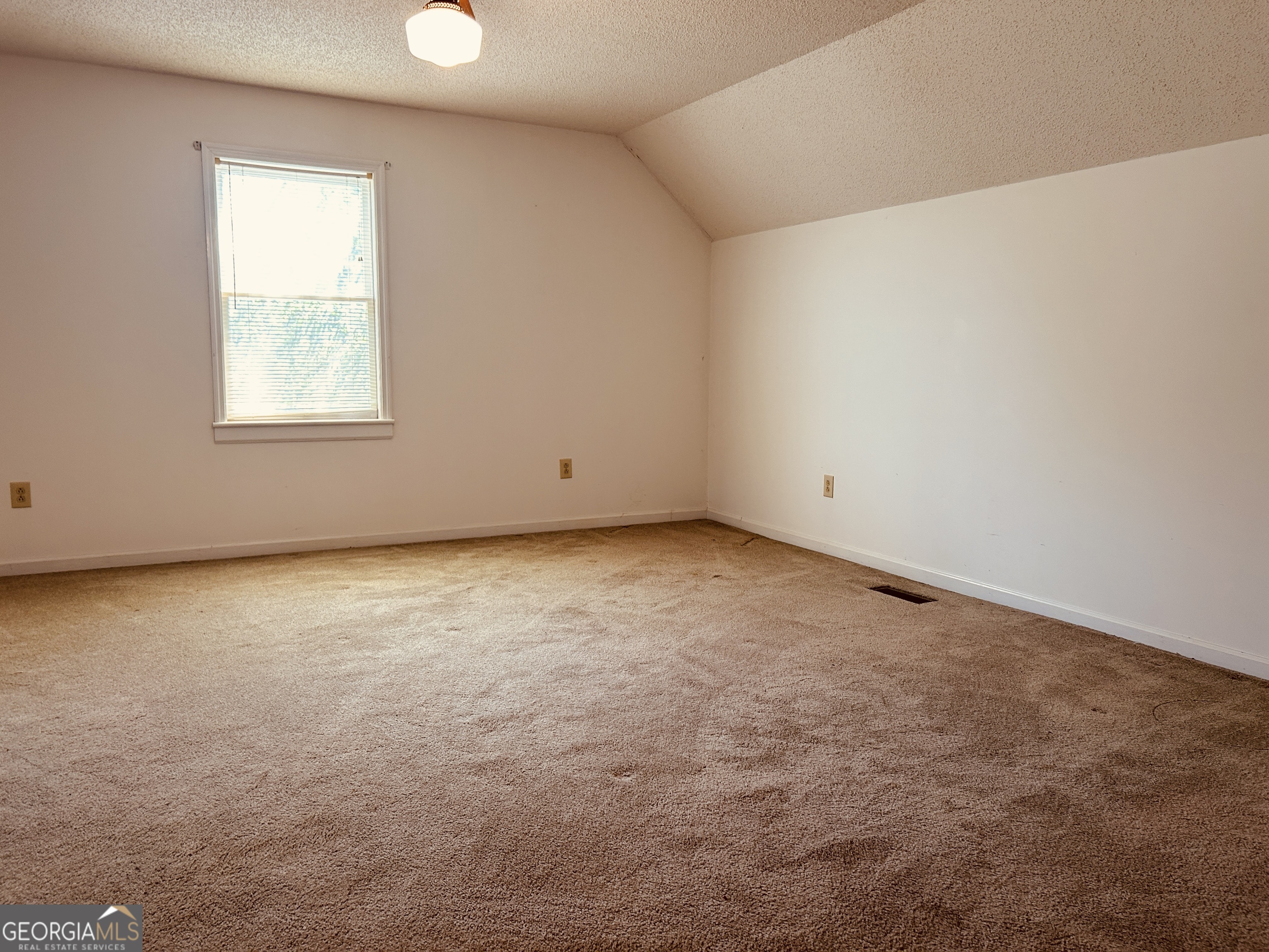 817 Yonah Homer Road Homer, GA 30547 - Photo 23 of 43 an empty room with a window