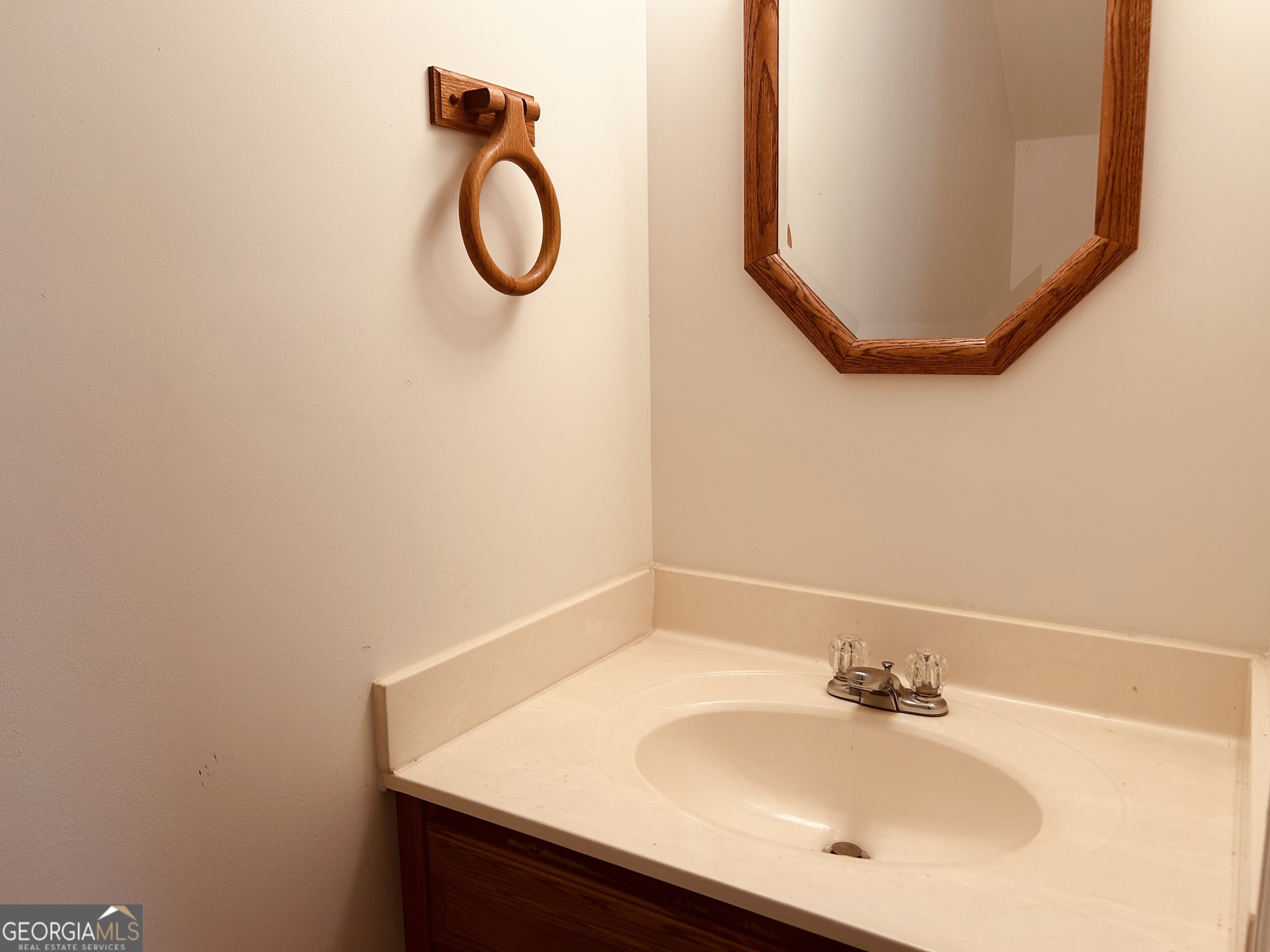 817 Yonah Homer Road Homer, GA 30547 - Photo 24 of 43 a bathroom with a sink and a mirror