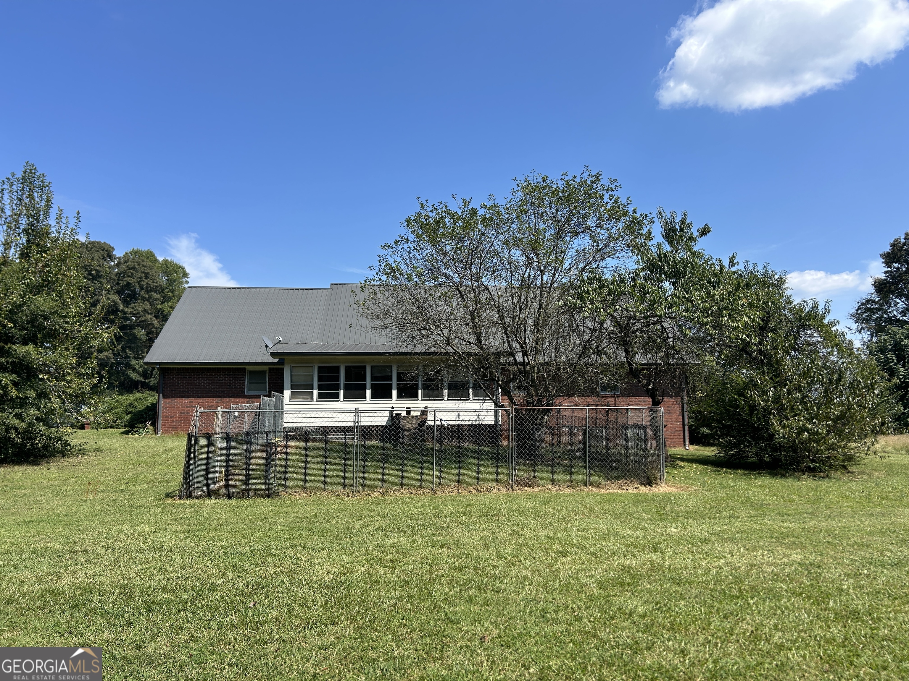 817 Yonah Homer Road Homer, GA 30547 - Photo 35 of 43 a view of a house with a yard