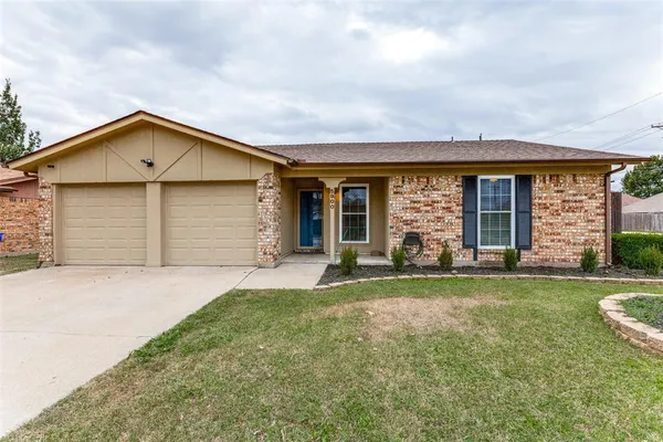 front view of a house with yard