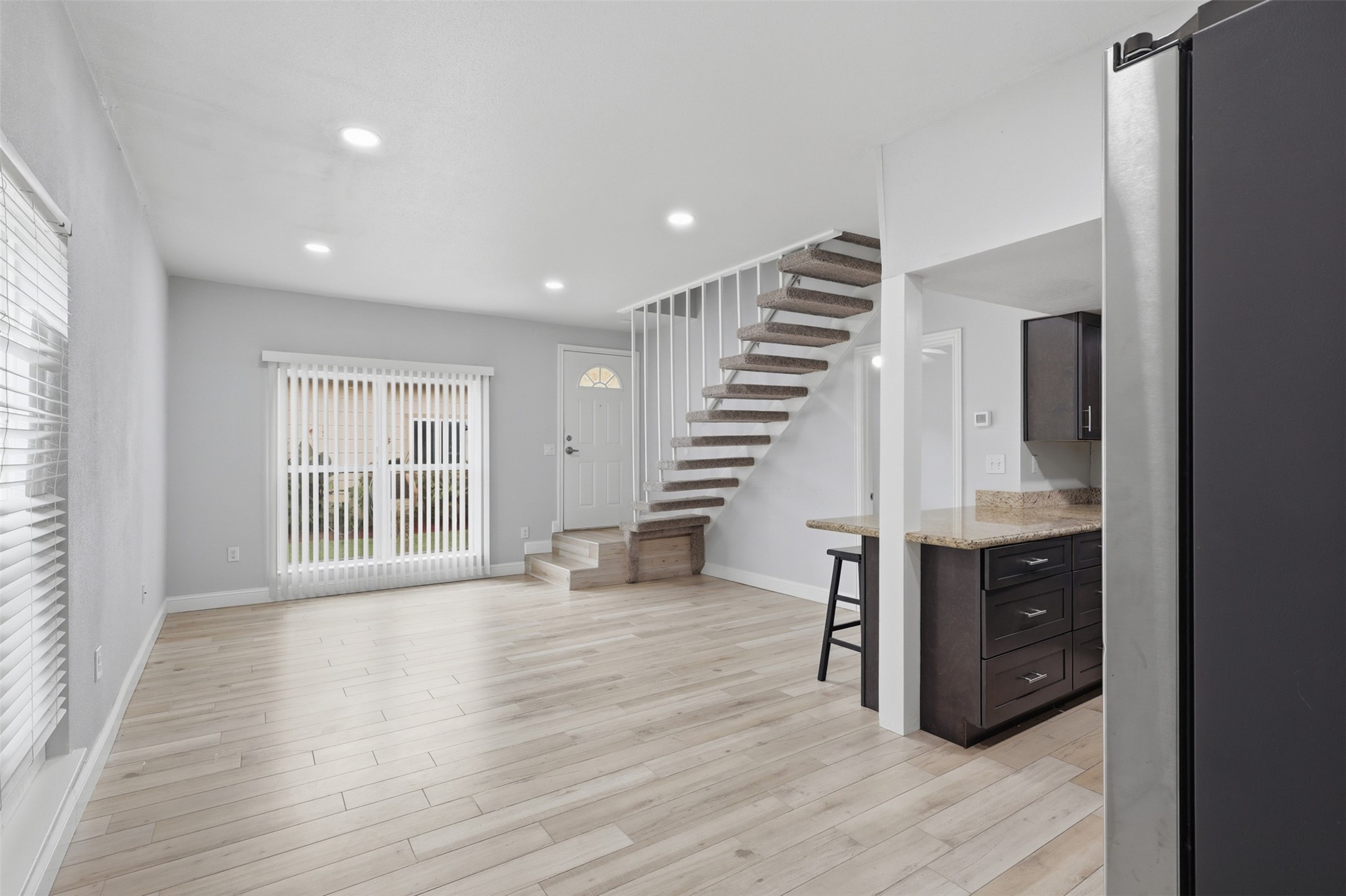 811 Threadneedle Street, Unit 287 Houston, TX 77079 - Photo 4 of 16 Open-concept living and dining space ideal for everyday living and entertaining.