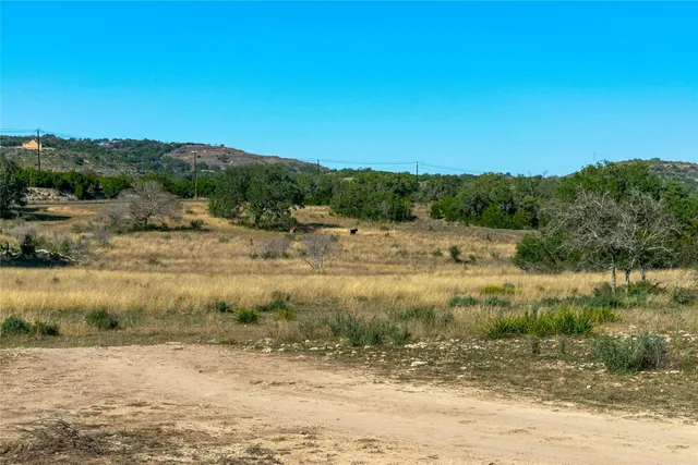 a view of a lake view with houses in the background