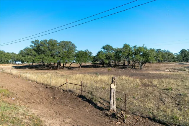 a view of swimming pool with a yard