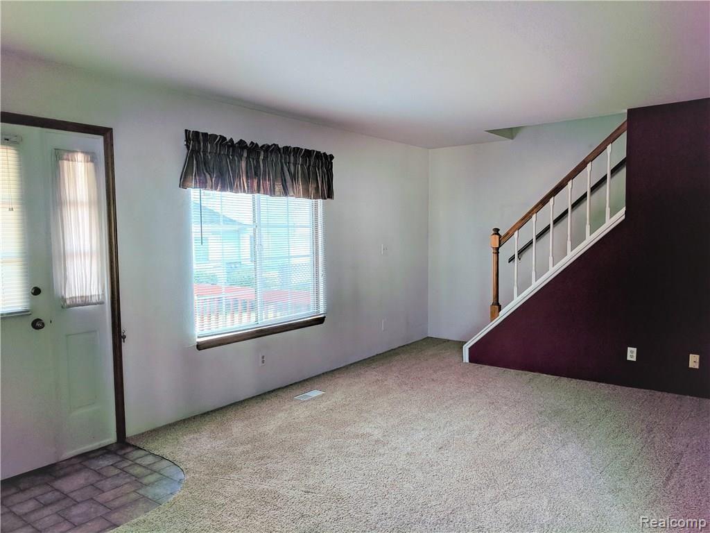 3944 Hunters Ridge Drive, Unit 3 Lansing, MI 48911 - Photo 2 of 25