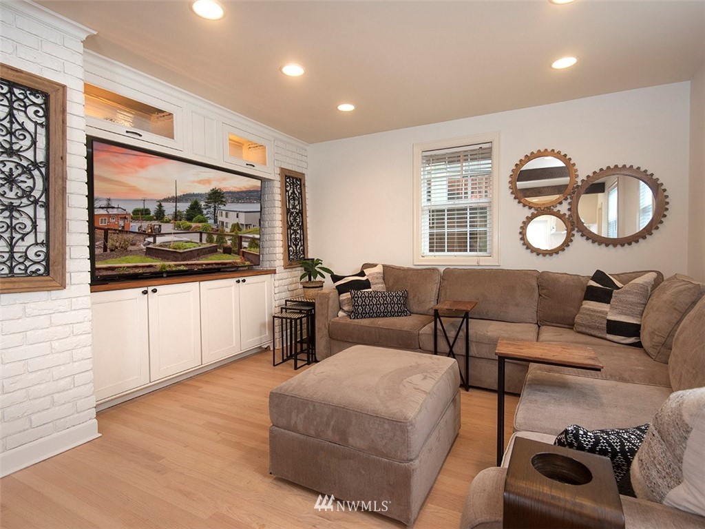 803 North 33rd Street Renton, WA 98056 - Photo 11 of 40 a living room with furniture and a flat screen tv