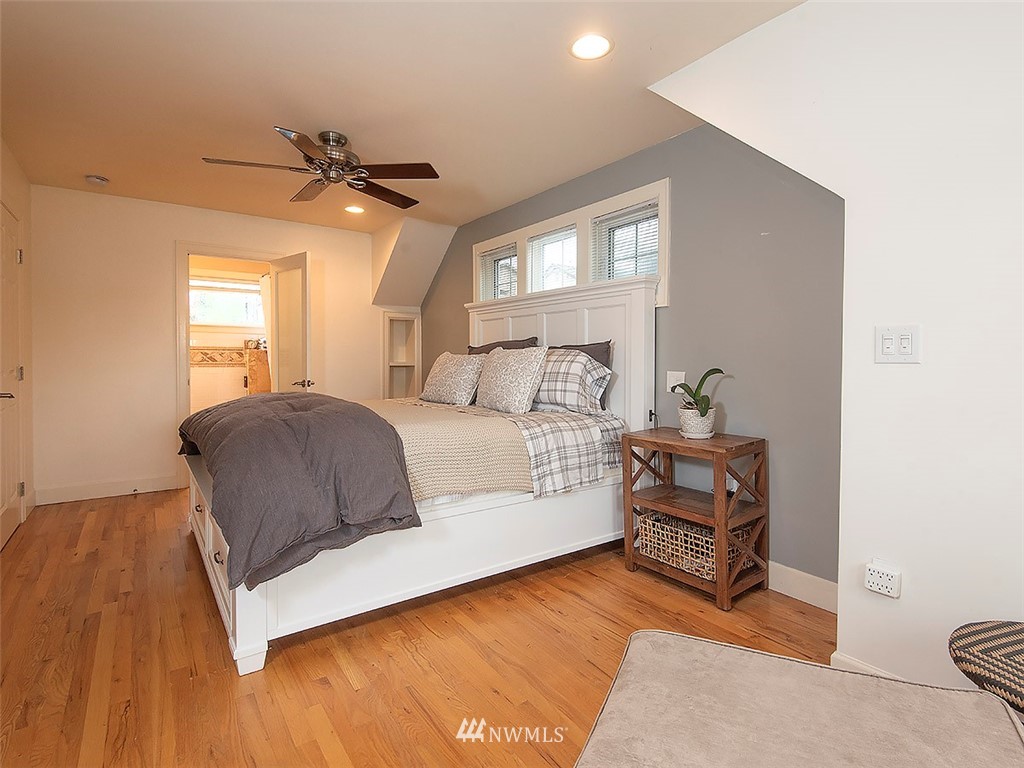 803 North 33rd Street Renton, WA 98056 - Photo 19 of 40 a bedroom with a bed and window