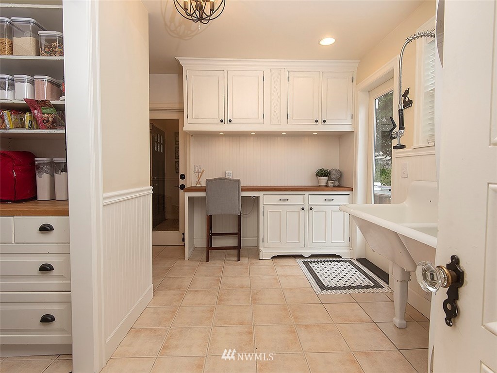 803 North 33rd Street Renton, WA 98056 - Photo 26 of 40 a kitchen with a cabinets and window