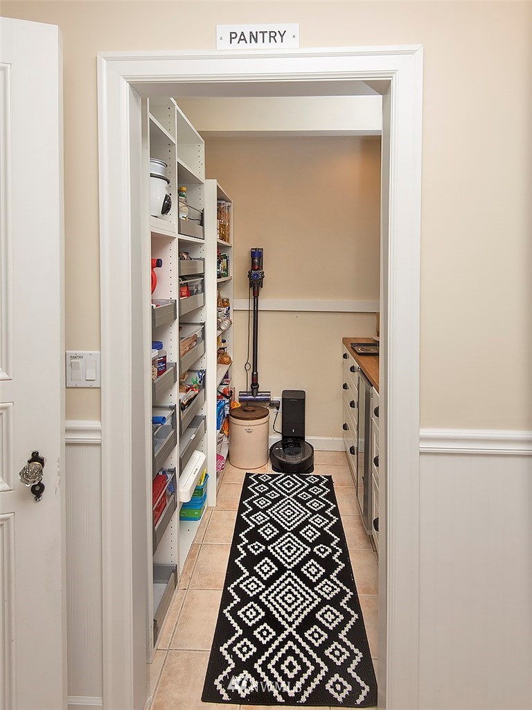 803 North 33rd Street Renton, WA 98056 - Photo 27 of 40 a walk in closet with wooden floor