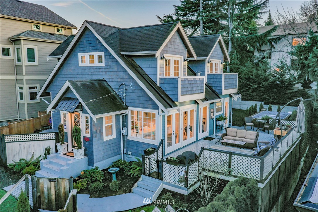 803 North 33rd Street Renton, WA 98056 - Photo 3 of 40 a front view of a house with a garden