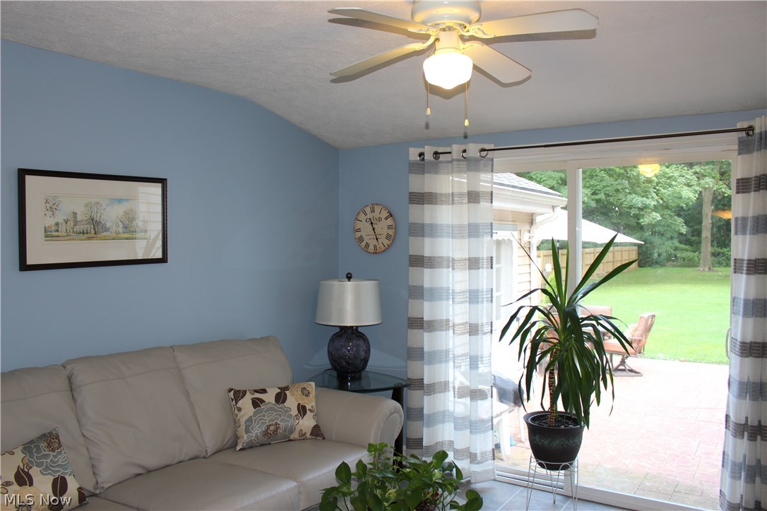 10471 Prouty Road Painesville, OH 44077 - Photo 14 of 33 Sun Room with tile floor, opens to the Patio .