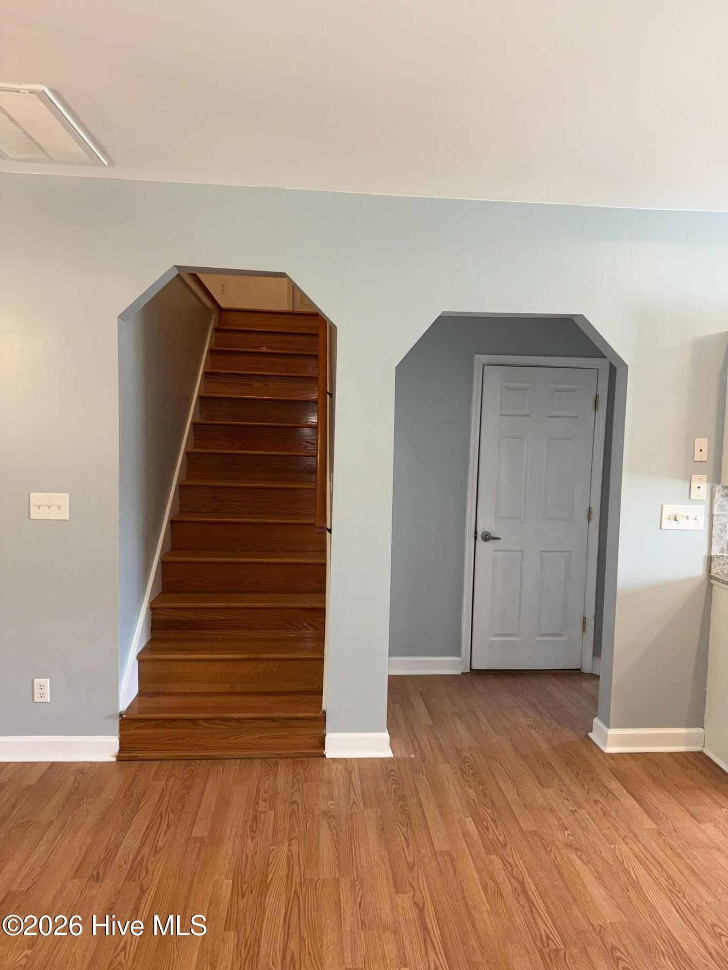477 Harkers Island Road Beaufort, NC 28516 - Photo 13 of 38 Stairs leading to upstairs bedroom