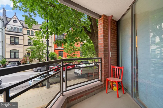 a view of a street from a balcony