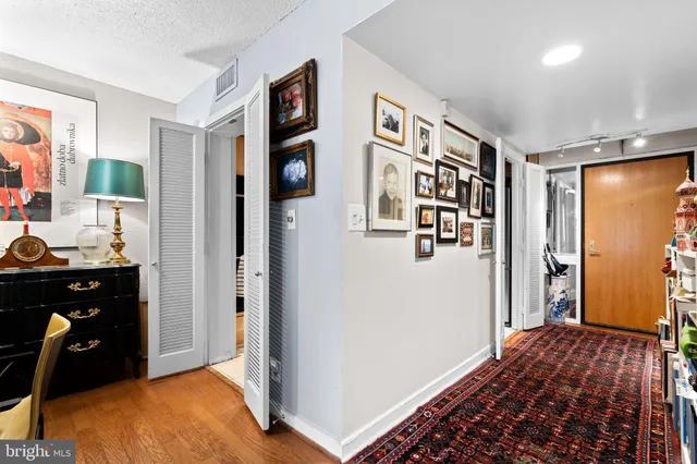 a view of a bedroom with closet area