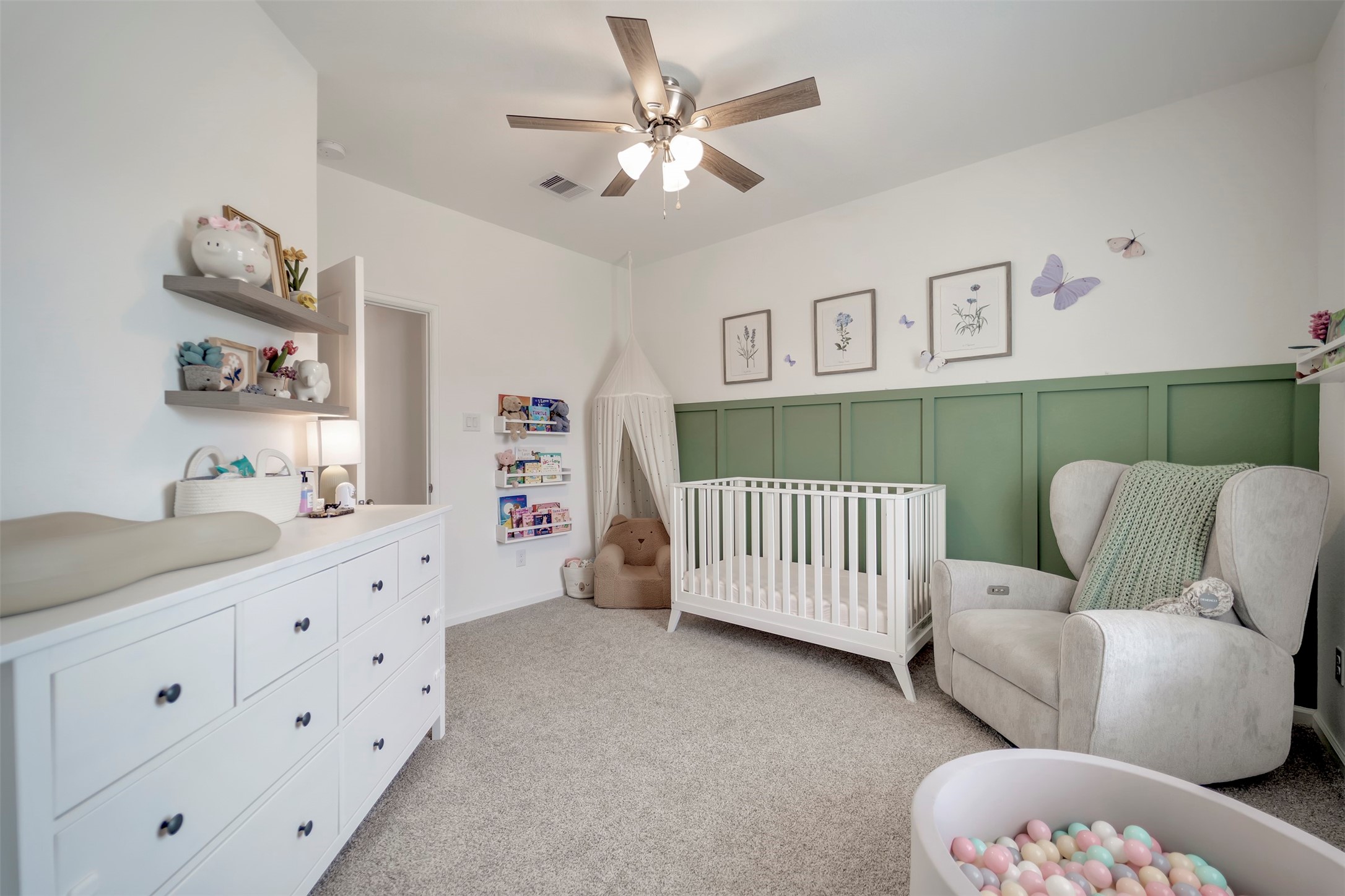 4127 Champlain Way Iowa Colony, TX 77583 - Photo 27 of 35 a bedroom with furniture and a wooden floor