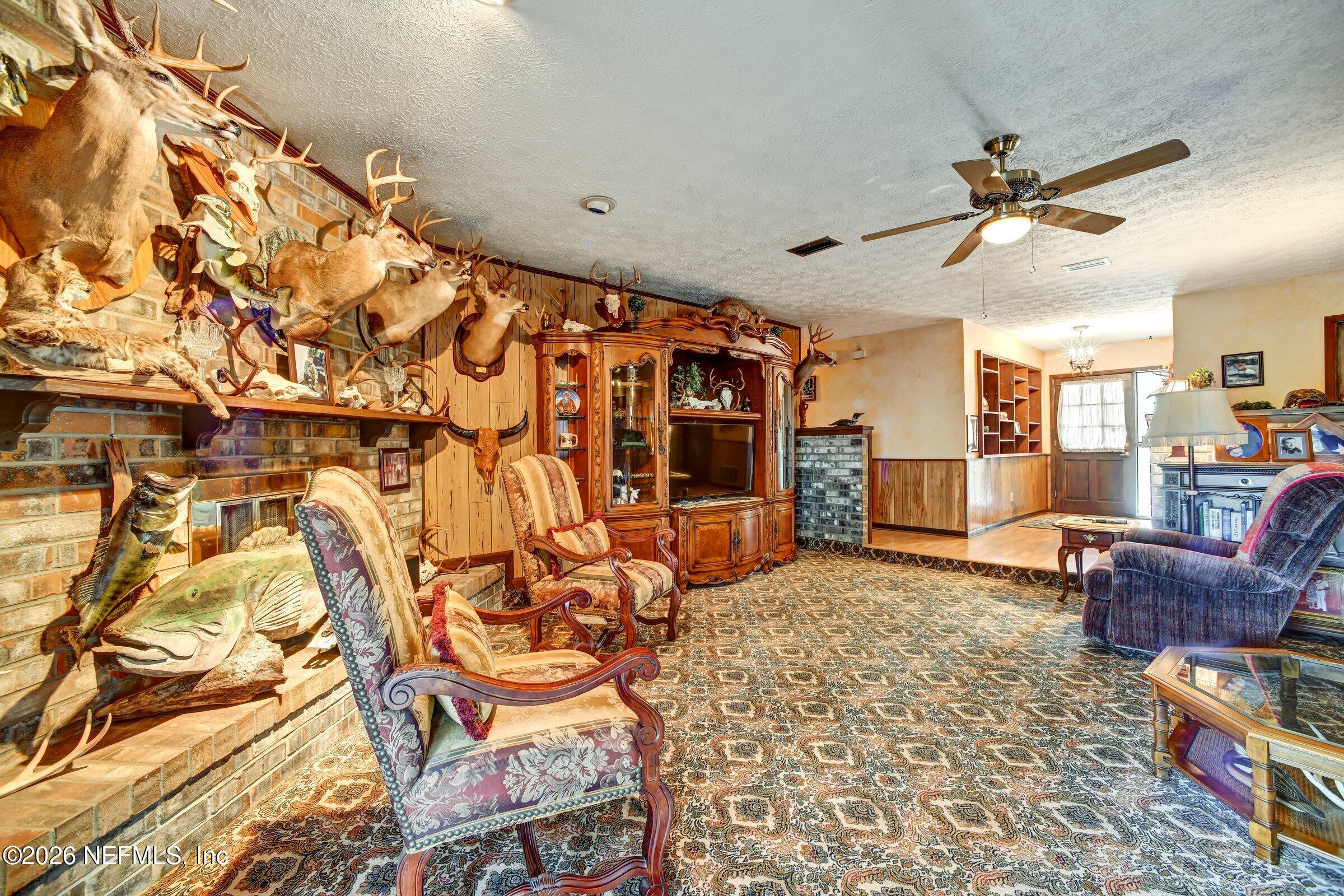 12790 Allport Road Jacksonville, FL 32258 - Photo 18 of 39 a living room with furniture and a rug