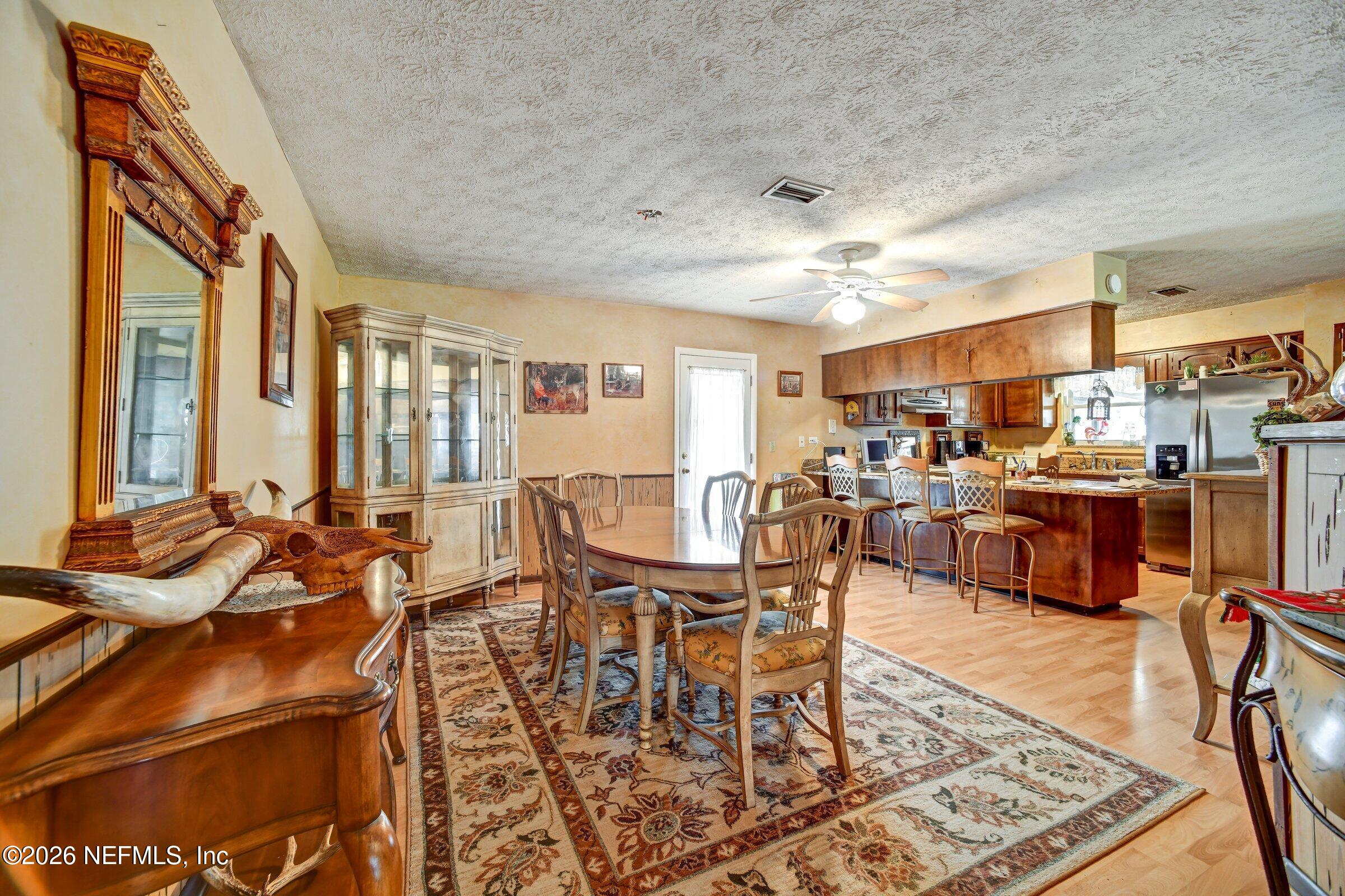 12790 Allport Road Jacksonville, FL 32258 - Photo 20 of 39 a view of a dining room with furniture