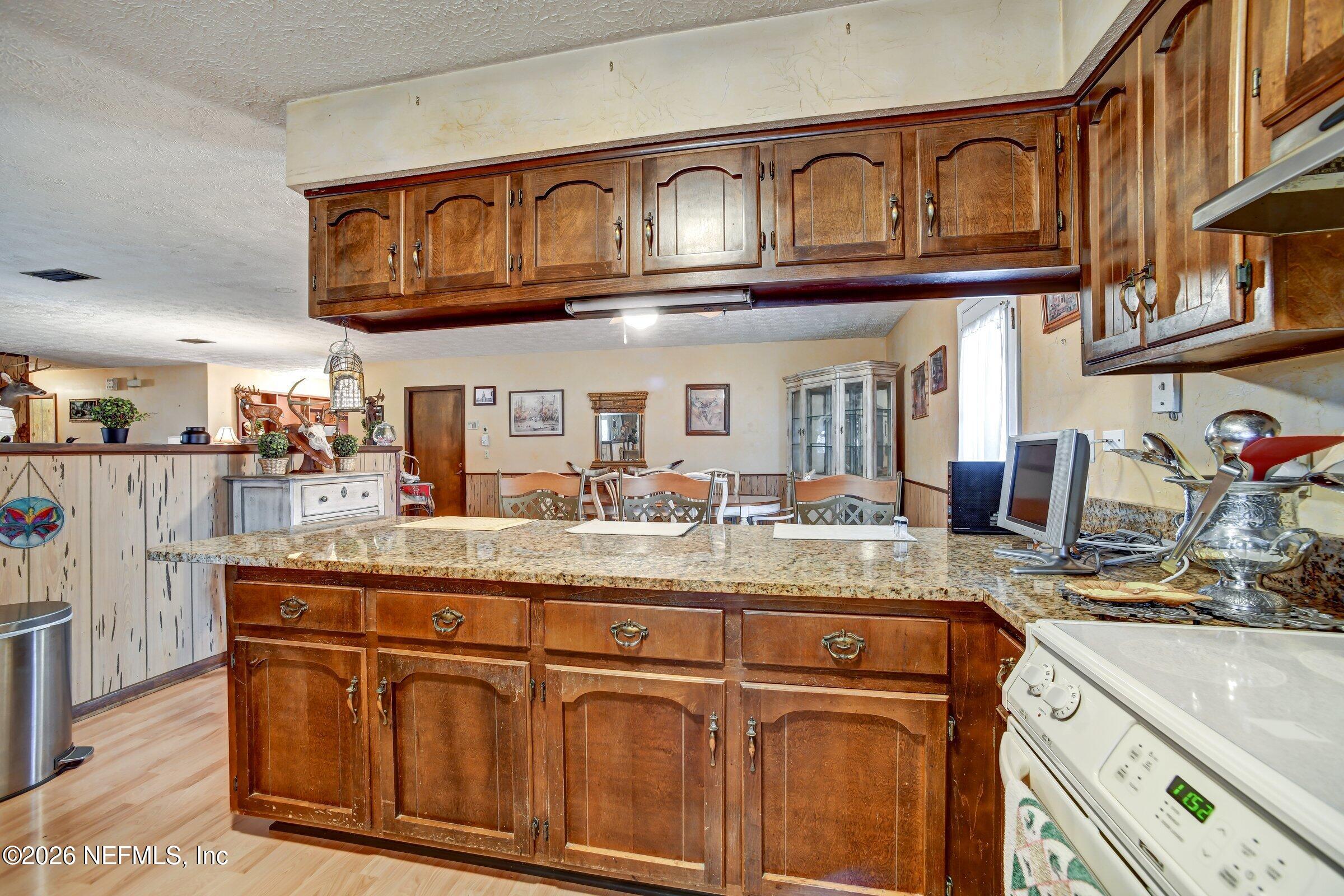 12790 Allport Road Jacksonville, FL 32258 - Photo 24 of 39 a kitchen with stainless steel appliances granite countertop a sink and cabinets