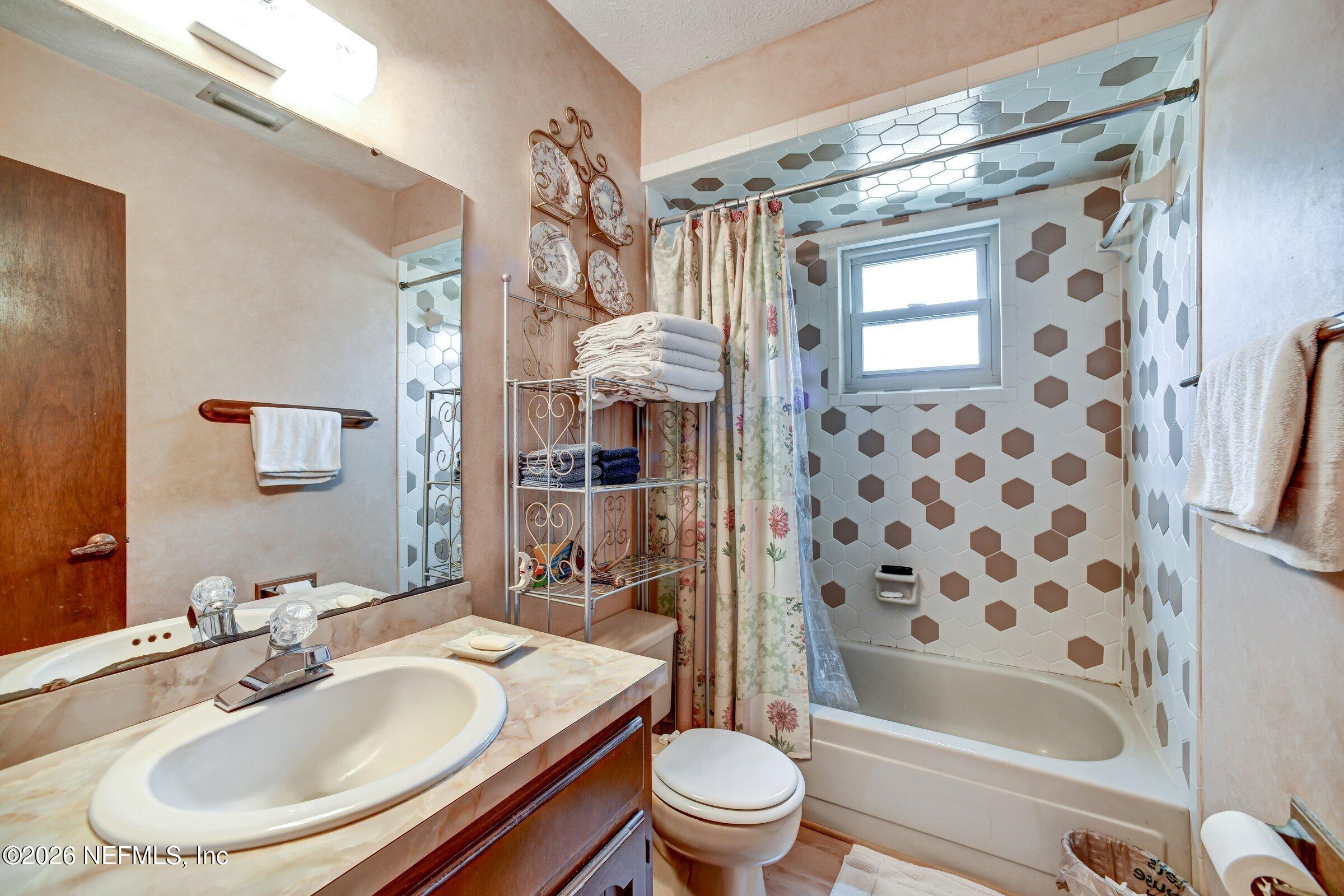 12790 Allport Road Jacksonville, FL 32258 - Photo 30 of 39 a bathroom with a sink toilet and shower