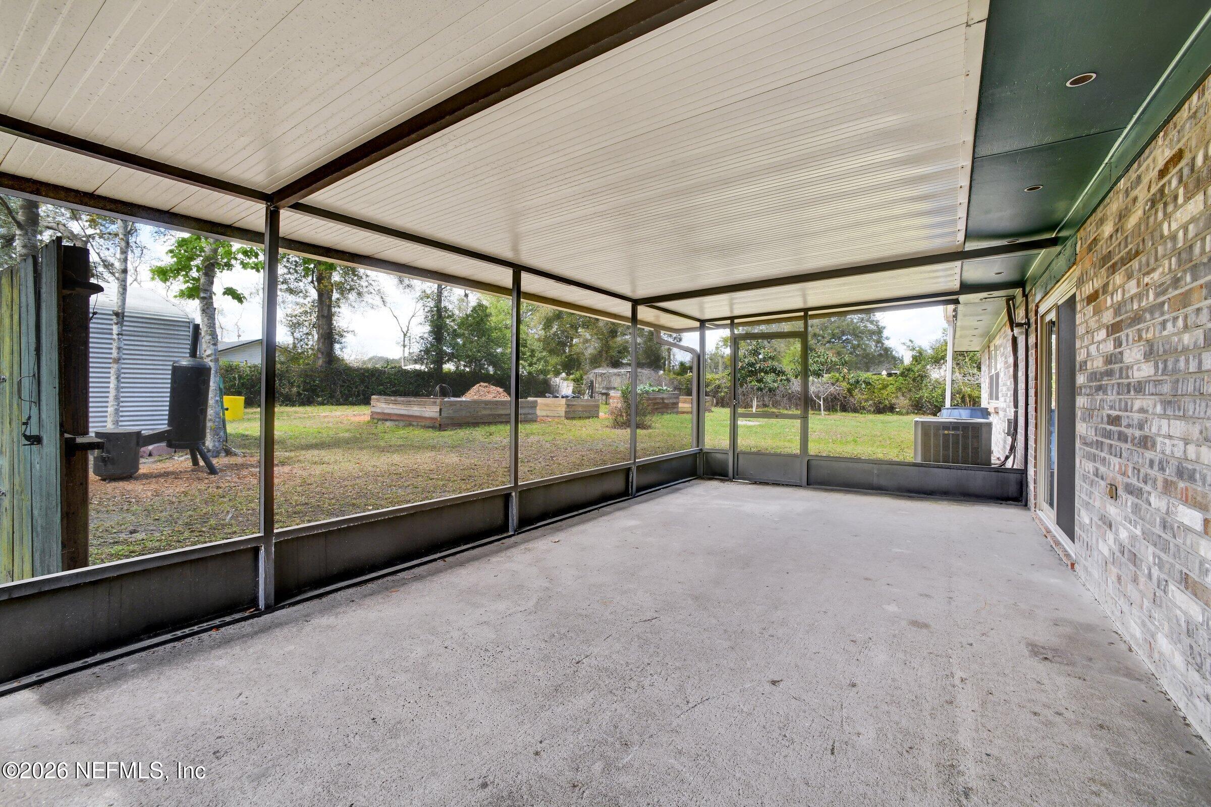 12790 Allport Road Jacksonville, FL 32258 - Photo 38 of 39 a view of a room with porch and outdoor space